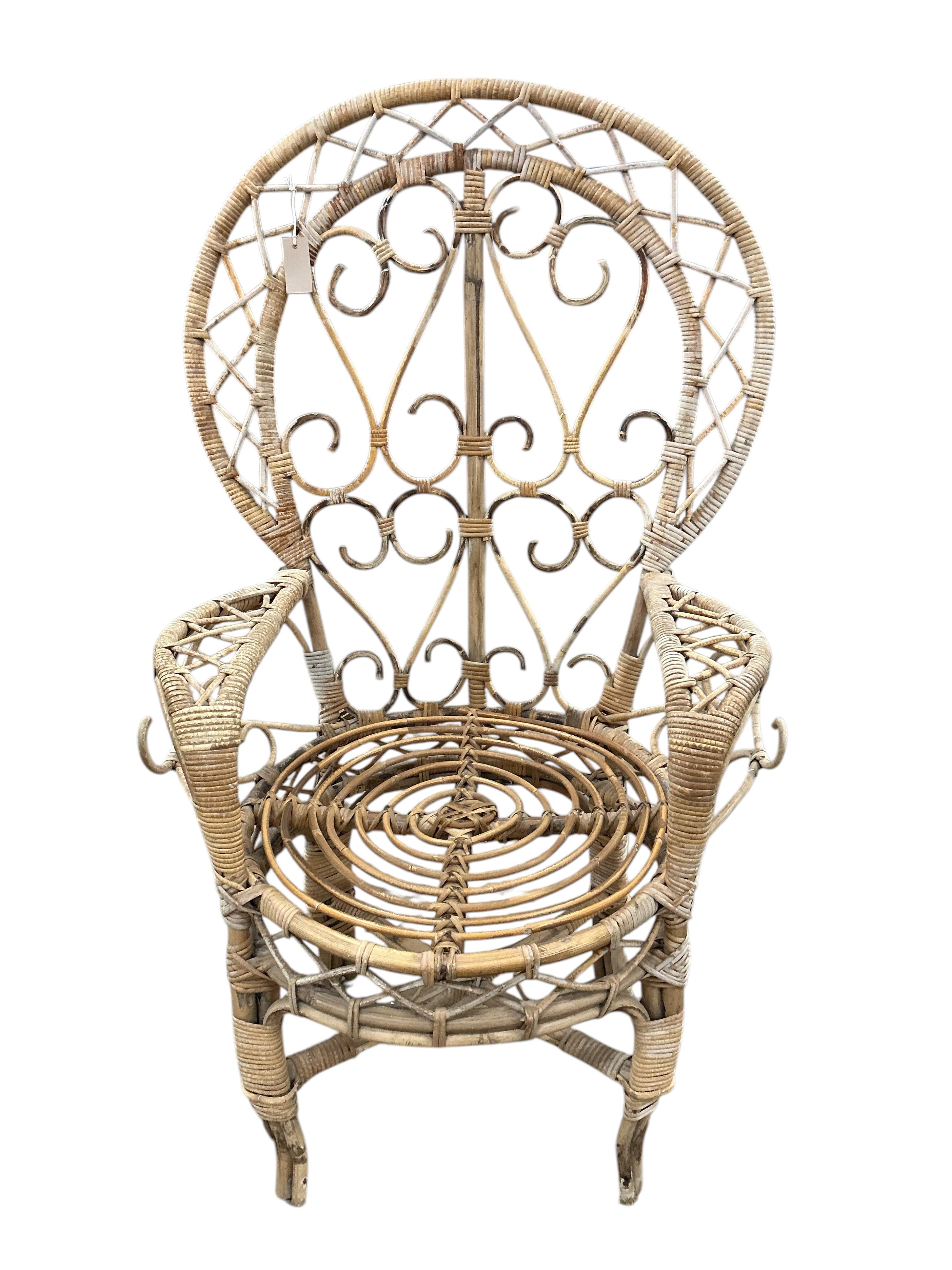 A pair of mid century caned bamboo peacock chairs, width 80cm, depth 56cm, height 134cm